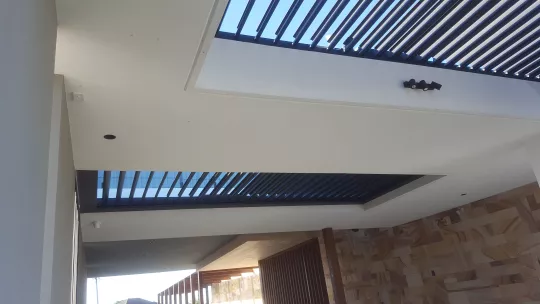 Opening Roof by Louvretec Central Coast in a frame by others. 