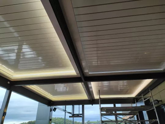 Dining Alfresco under motorised Opening Roofs with Lighting by Louvretec Melbourne